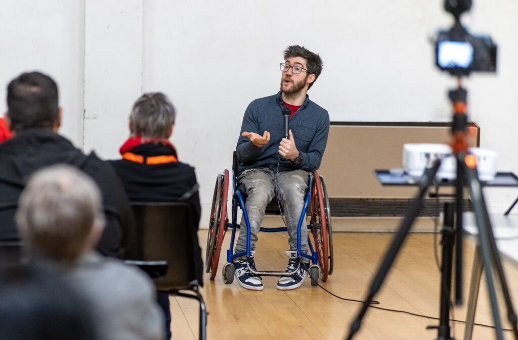 Aaron Simmonds performing comedy