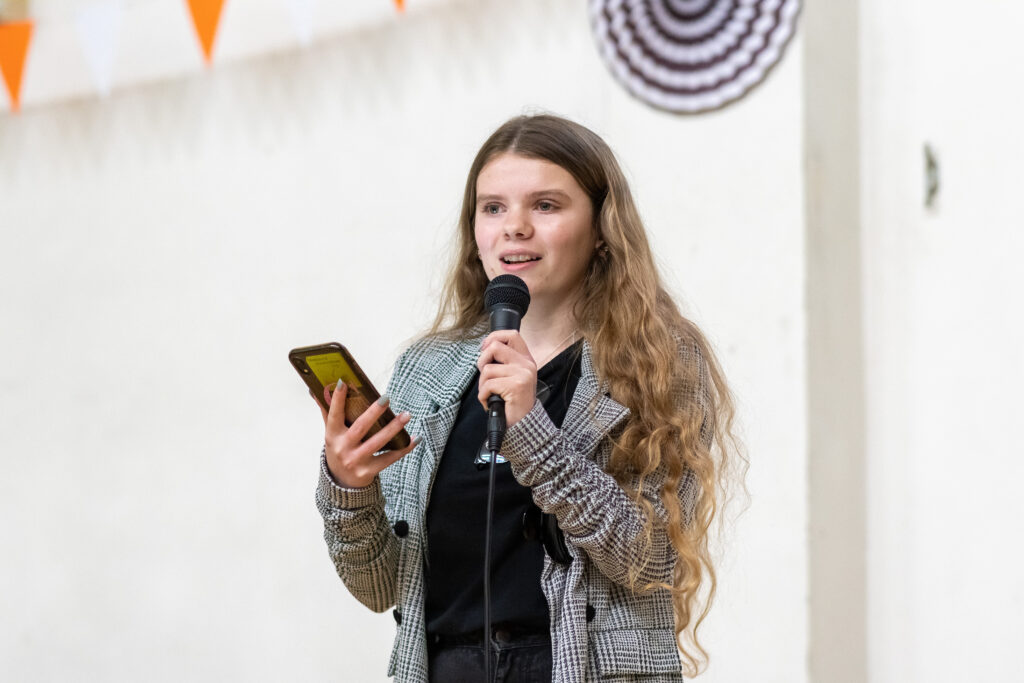 Chloe performing poetry
