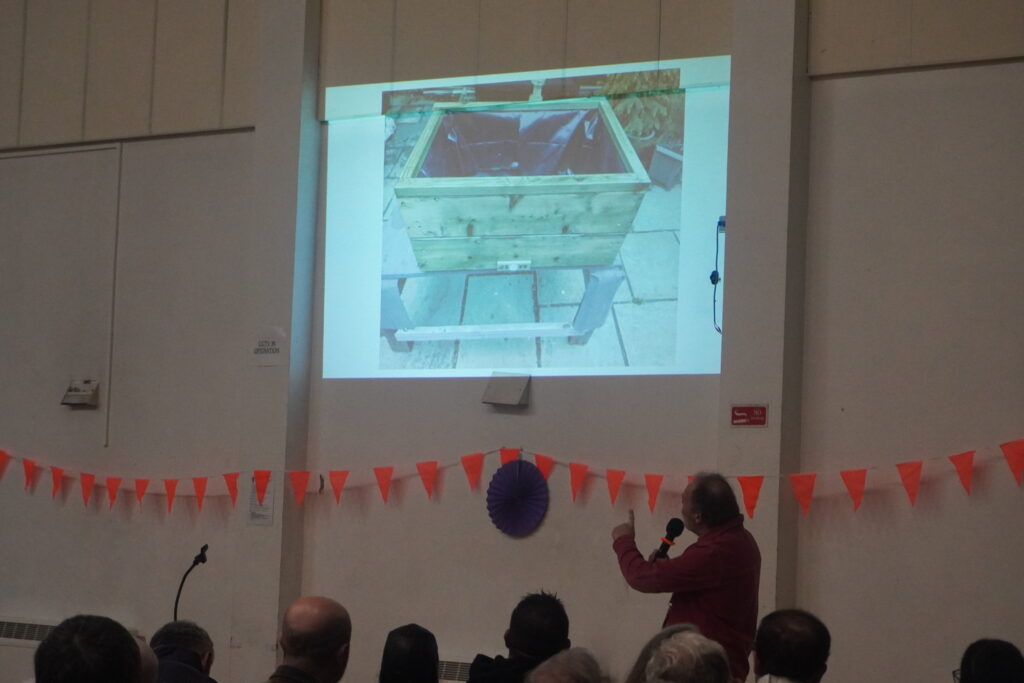 Duncan talking about the planter he made.