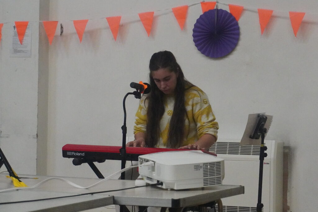 Holly playing the keyboard