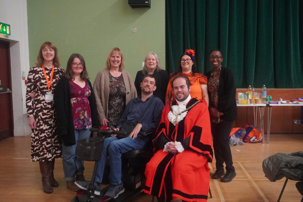 Deputy Mayor and Mayoress with members of the X by X team