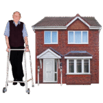 Elderly man with a walker standing next to a model of a red brick house.